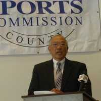 <p>Wah Chu, the father of four-time Olympian Julie Chu, speaks at an announcement Tuesday in Stamford. Julie Chu was one of seven people selected for the Fairfield County Sports Hall of Fame.</p>