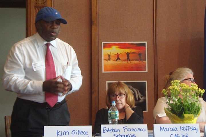 Esteban Francisco Sebourne talks about the community conversations at the annual meeting of the Southwest Regional Mental Health Board in Norwalk.