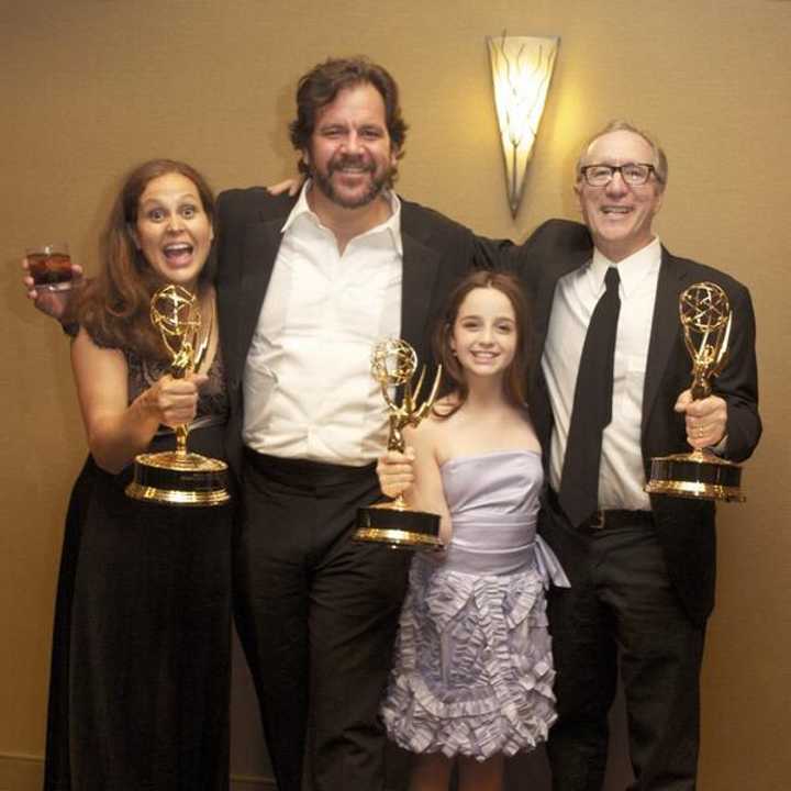 Hayley Negrin of Weston, second from right, poses with her Emmy and other winners from &#x27;Peg + Cat.&#x27; 