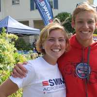 <p>Greenwich High School seniors and Alliance for Cancer Gene Therapy (ACGT) interns Nicole Graham, left, and Alex Lewis meet at Swim Across America. Graham is a cancer survivor.
 </p>