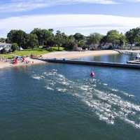 <p>An aerial view of swimmers in Swim Across America.</p>