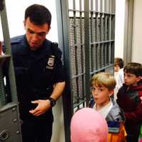 <p>Chapel School kindergarten students get a tour of the police cells in Tuckahoe.</p>