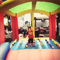 <p>Children playing in the Bouncy House at Koala Park Daycare in Tuckahoe.</p>