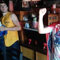 <p>Ryan Baker from White Plains cheers on Team USA on Tuesday afternoon during the World Cup game against Belgium.</p>