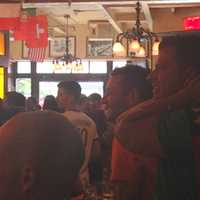 <p>Fans react to USA&#x27;s loss Tuesday against Belgium in the World Cup Round of 16. </p>