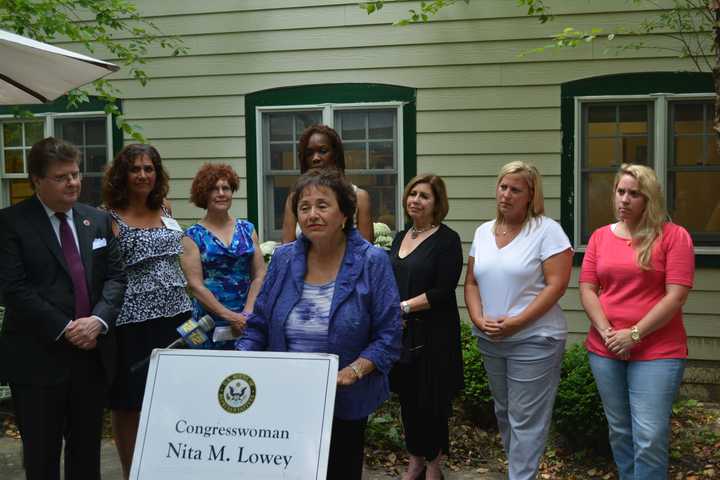 Rep. Nita Lowey, center, at a press conference at Mount Kisco Child Care Center.