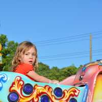 <p>Southeast resident Gabriella Galluzzo, 2, on a ride.</p>