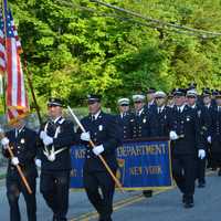 <p>Mount Kisco firefighters march in the parade.</p>