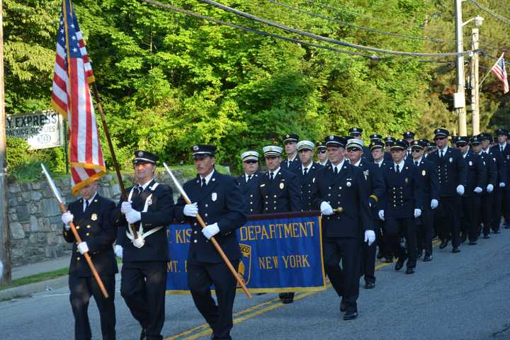 Mount Kisco firefighters march in the parade.