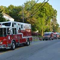 <p>A procession of Mount Kisco firetrucks. </p>