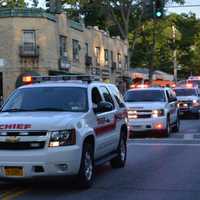 <p>A procession of Chappaqua Fire Department vehicles in the Mount Kisco parade.</p>