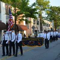 <p>Millwood firefighters march in the Mount Kisco parade.</p>