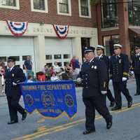 <p>Ossining firefighters march in Mount Kisco&#x27;s parade.</p>