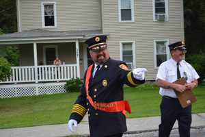 Putnam Firefighters March In Brewster Parade