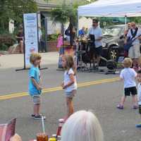 <p>Bronxville youngsters dancing in the street. </p>