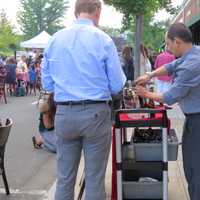 <p>Eastchester resident Jake Willis purchasing a beer in Bronxville on Thursday.</p>