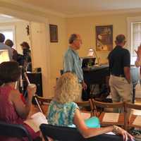 <p>Parents and their adult children with developmental issues gather in a Greenwich home Saturday to discuss the concerns about state aid. </p>