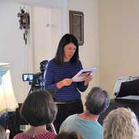 <p>Barbara Laman of Greenwich speaks at the meeting Saturday about her experiences with her son. </p>