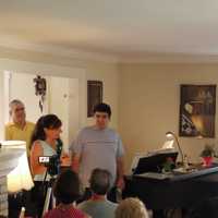 <p>Parents and their adult children with developmental issues gather in a Greenwich home Saturday to discuss the concerns about state aid. </p>