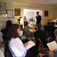 <p>Parents and their adult children with developmental issues gather in a Greenwich home Saturday to discuss the concerns about state aid. </p>
