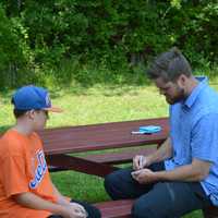 <p>Lucas Duda at an autograph signing at Summer Trails Day Camp in Somers.</p>