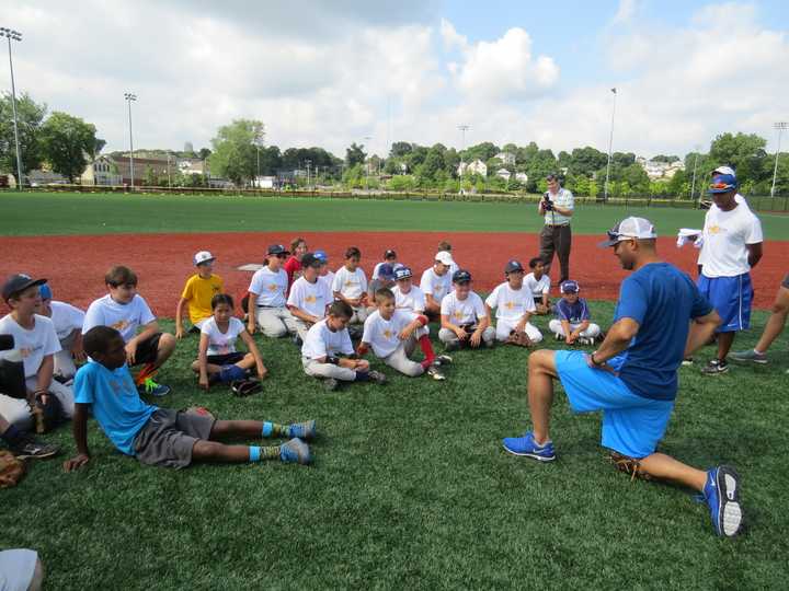 Yankees legend Mariano Rivera offering advice to New Rochelle campers at A-Game Sports baseball camp.