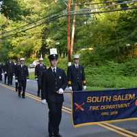 <p>South Salem firefighters march in their parade.</p>