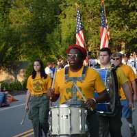 <p>A drummer leads a unit in the South Salem Fire Department parade on  Route 35.</p>