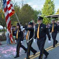 <p>Goldens Bridge firefighters march in the South Salem parade.</p>