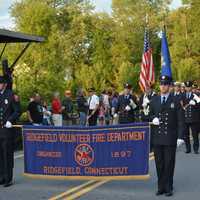 <p>Ridgefield firefighters march in the South Salem parade.</p>