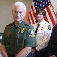 <p>Capt. Raul Camejo, of the state environmental police, speaks at a press conference Thursday about the boating-related death of 16-year-old Emily Fedorko. Looking on are Capt. Pamela Gustovich, center and First Selectman Peter Tesei. </p>