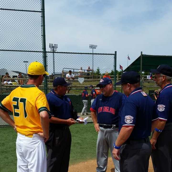 Danbury and Idaho exchange lineups prior to Monday&#x27;s game at the Cal Ripken World Series in Aberdeen, Md. 