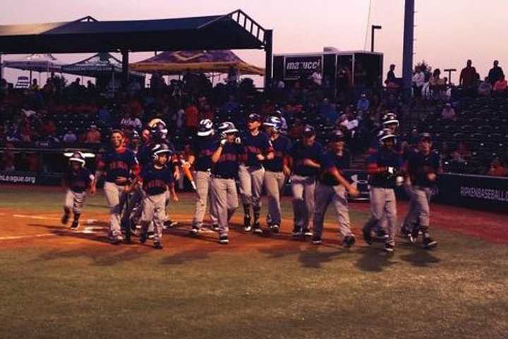 Javon Hernandez is congratulated by Danbury teammates after hitting a two-run home run on Wednesday night. 