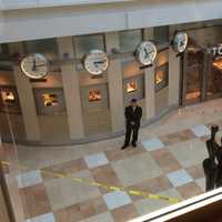 <p>Police put up yellow tape to block off the area in front of Tourneau, which was robbed Sunday. </p>