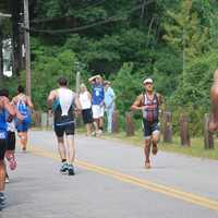 <p>Easton&#x27;s Chris Thomas heads for first place among amateur athletes in Sunday&#x27;s 70.3 mile Ironman race in New Hampshire. </p>