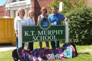 Stamford Realtors Deliver Backpacks To Elementary Schools