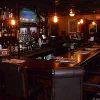 <p>A view of the bar area at Center Street Public House in Darien.</p>