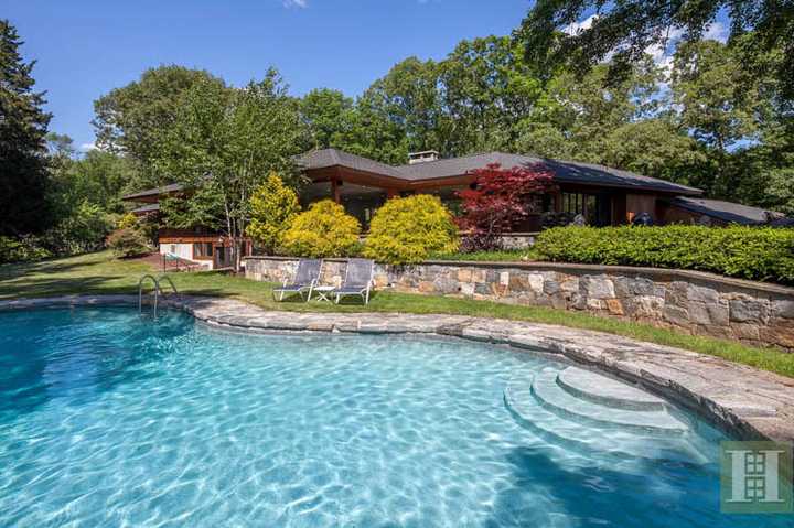 Celebrities such as Marilyn Monroe enjoyed the pool at 8 Circle Road in Darien when the home was owned by illustrator Jon Whitcomb.