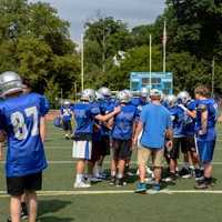 <p>JV Coach Jeff Napolitano looks on in the huddle.
 </p>