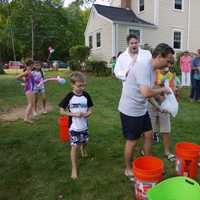 <p>Norwalk State Sen. Bob Duff and Ridgefield Dr. Shawn Tittle both dumped buckets of ice water over their heads in response to their ALS Ice Bucket Challenges. </p>