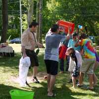 <p>Norwalk State Sen. Bob Duff and Ridgefield Dr. Shawn Tittle both dumped buckets of ice water over their heads and several of the kids in attendance Sunday, in response to their ALS Ice Bucket Challenges. </p>