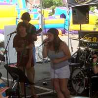 <p>Students of the School of Rock perform at the Blues, Views and BBQ Festival.</p>