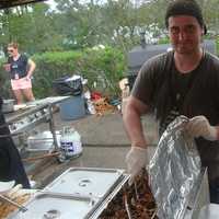 <p>James Farrell of Bobby Q&#x27;s serves up delicious barbecue at the Blues, Views and BBQ Festival.</p>