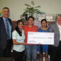 <p>Vincent Santilli, Executive Director of Peoples United Community Foundation; Maria Gutierrez, Mari Martinez, and Marley Gonzalez Herrera,  Mercy Learning Center program participants; Jane Ferreira, President and CEO; and Armando Goncalves.</p>