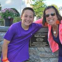 <p>Kyles best friend, Rocco Abbate and Kyles fifth-grade teacher, Kristen Ball, remember Kyle during the opening of Kyles Court.</p>