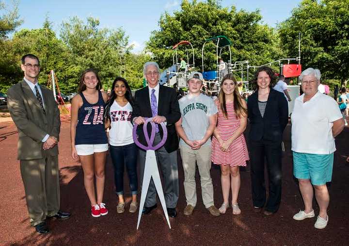 The ribbon-cutting ceremony at the for the new playground at Six to Six Magnet School in Bridgeport. See story for IDs. 