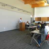 <p>A professor teaches a class in the new environmental classroom building. </p>