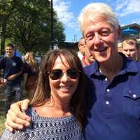 <p>School of Education Assistant Clinical Professor Lauren Birney with former President Clinton.</p>