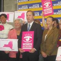 <p>Justin Wagner flanked by supporters at a rally in Thornwood. </p>