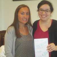 <p>Kristin McConnell and Elaine Santos said it was important to say thank you on Sept. 11.</p>